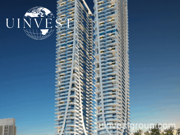 Elitz 2 twin glass towers with landscaped forecourt under a clear blue sky in Jumeirah Village Circle, Dubai.