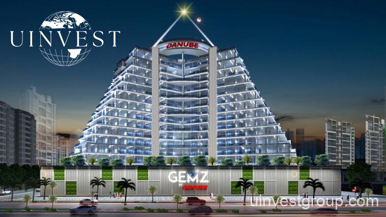 Gemz by Danube pyramid-inspired façade in Al Furjan, Dubai, under a clear blue sky