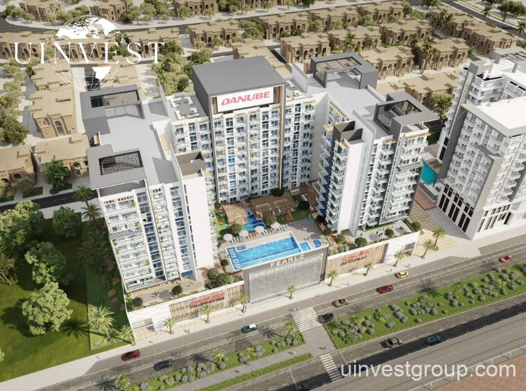 Architectural rendering of Pearlz by Danube’s 13-storey residential building in Al Furjan, Dubai, showcasing a clean contemporary façade, private balconies, infinity pool, landscaped podium gardens, water features, and a retail podium at street level