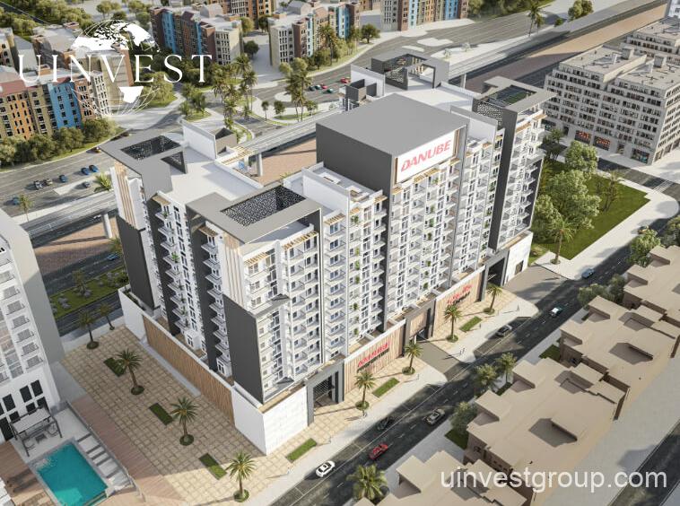 Architectural rendering of Pearlz by Danube’s 13-storey residential building in Al Furjan, Dubai, showcasing a clean contemporary façade, private balconies, infinity pool, landscaped podium gardens, water features, and a retail podium at street level