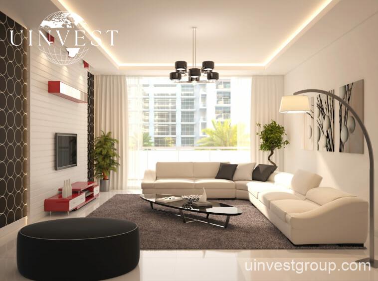 Open-plan studio apartment interior at Glitz by Danube featuring floor-to-ceiling windowsOpen-plan studio apartment interior at Glitz by Danube featuring floor-to-ceiling windows