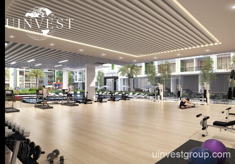 Rendering of Olivz by Danube’s modern residential towers in Al Warsan First, Dubai, featuring neutral-toned façades, landscaped gardens, water features, and swimming pools.