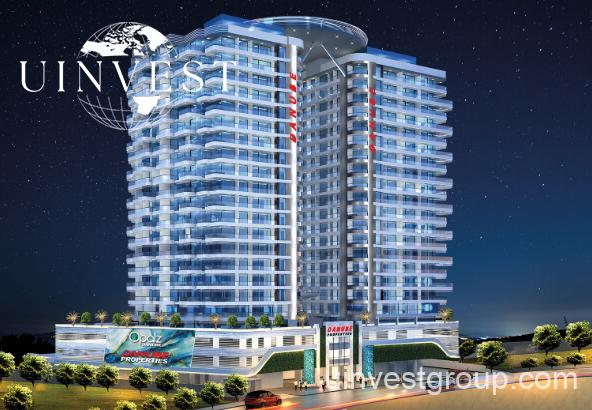Architectural rendering of Opalz by Danube’s twin 19-storey residential towers in Arjan, Dubai, showcasing neutral-toned façades, private balconies overlooking landscaped water bodies, and integrated leisure facilities.
