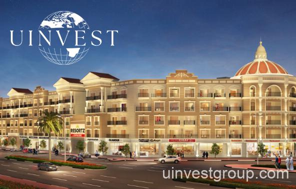 Family-friendly children’s play area with shaded playground and splash pad within the Resortz community.