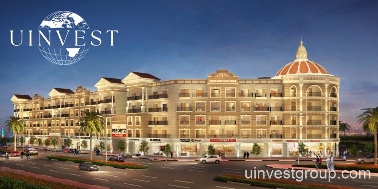 Family-friendly children’s play area with shaded playground and splash pad within the Resortz community.