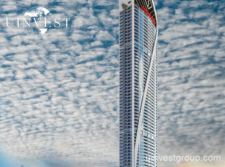 62-storey Fashionz tower with FashionTV branding under clear blue skies in Jumeirah Village Triangle, Dubai.