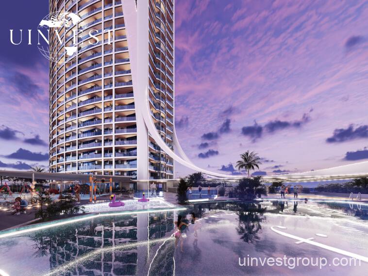 62-storey Fashionz tower with FashionTV branding under clear blue skies in Jumeirah Village Triangle, Dubai.