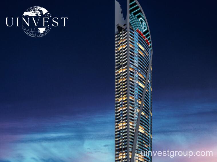 62-storey Fashionz tower with FashionTV branding under clear blue skies in Jumeirah Village Triangle, Dubai.
