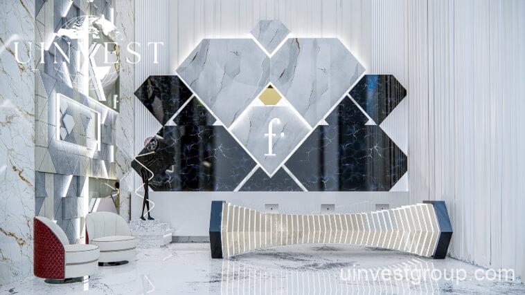62-storey Fashionz tower with FashionTV branding under clear blue skies in Jumeirah Village Triangle, Dubai.