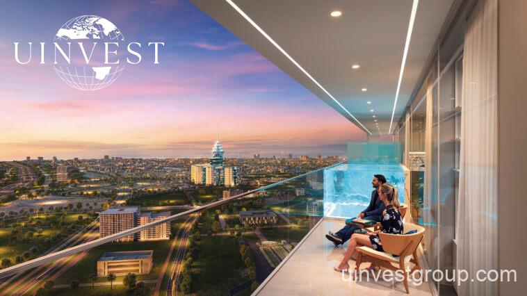 Exterior view of Oasiz by Danube in Dubai Silicon Oasis, a 38-storey glass-clad tower with landscaped podium and central pool.