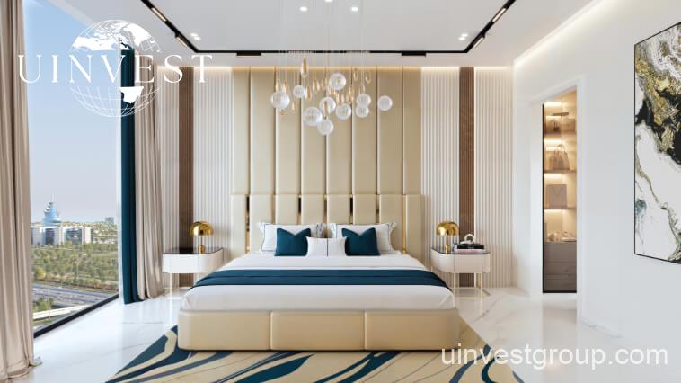 Exterior view of Oasiz by Danube in Dubai Silicon Oasis, a 38-storey glass-clad tower with landscaped podium and central pool.