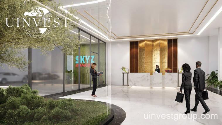 Exterior view of Skyz by Danube tower in Arjan, Dubailand, featuring terraced green sky gardens, open-air plazas, and Mediterranean-themed architecture.