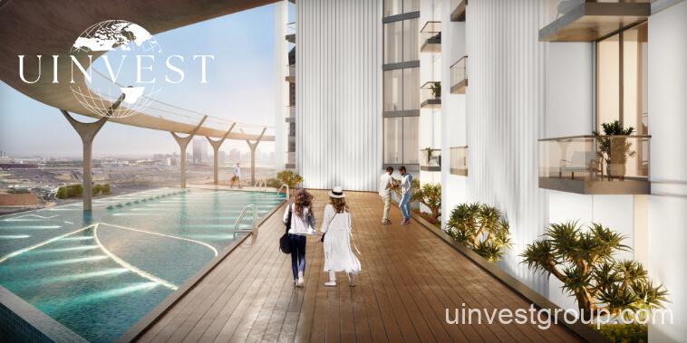 Exterior view of Skyz by Danube tower in Arjan, Dubailand, featuring terraced green sky gardens, open-air plazas, and Mediterranean-themed architecture.
