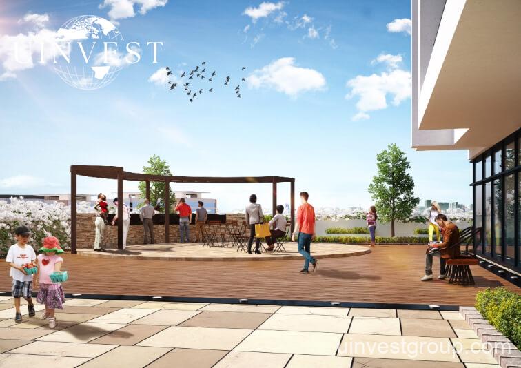 Landscaped podium gardens with barbecue areas and vertical garden walls at Jewelz by Danube