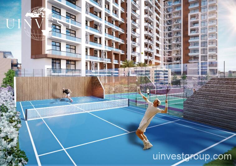 Landscaped podium gardens with barbecue areas and vertical garden walls at Jewelz by Danube