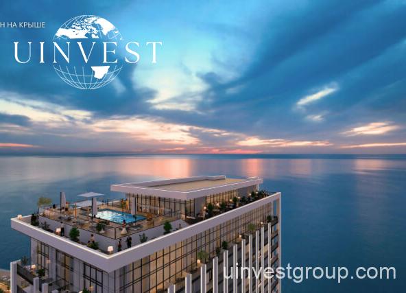 Modern high-rise tower of Delux Horizon Batumi with Black Sea in background