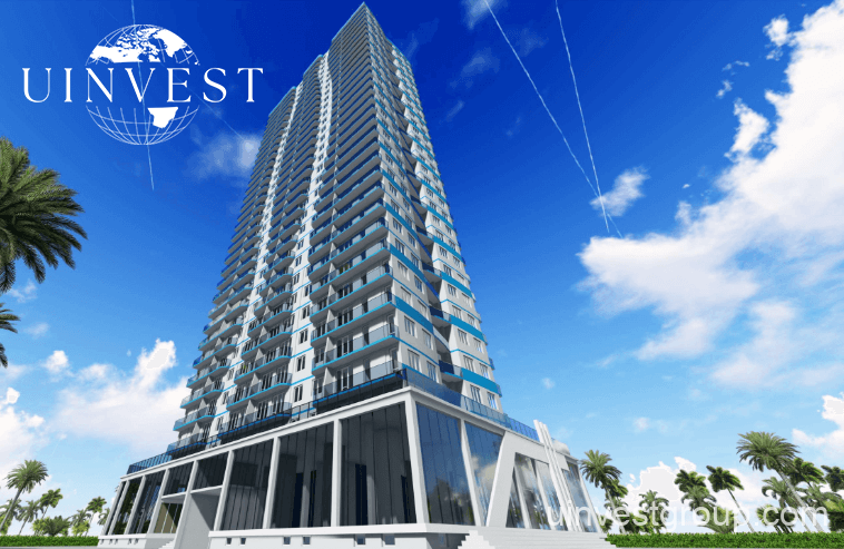Wide-angle shot of Horizon Elegance Tower surrounded by palm trees and walking paths, a short walk from the Batumi coastline.