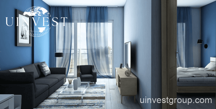 Furnished studio apartment in Horizon Elegance with floor-to-ceiling windows, sea view, and modern interior design.