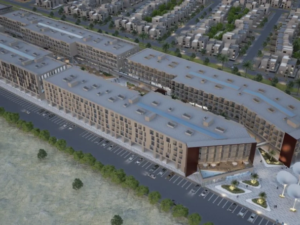 Aerial drone view of the Plumeria, Sohar apartment complex with rooftop swimming pools