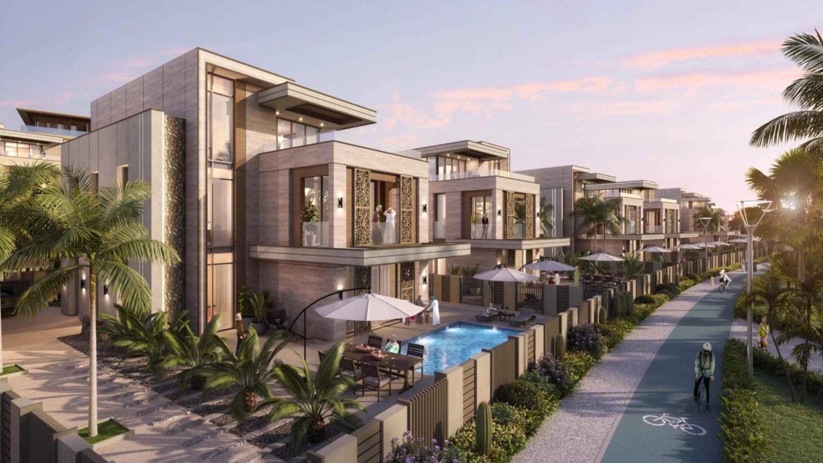 Villas along a cycling path at Sarooj Oasis, Sultan Haitham City
