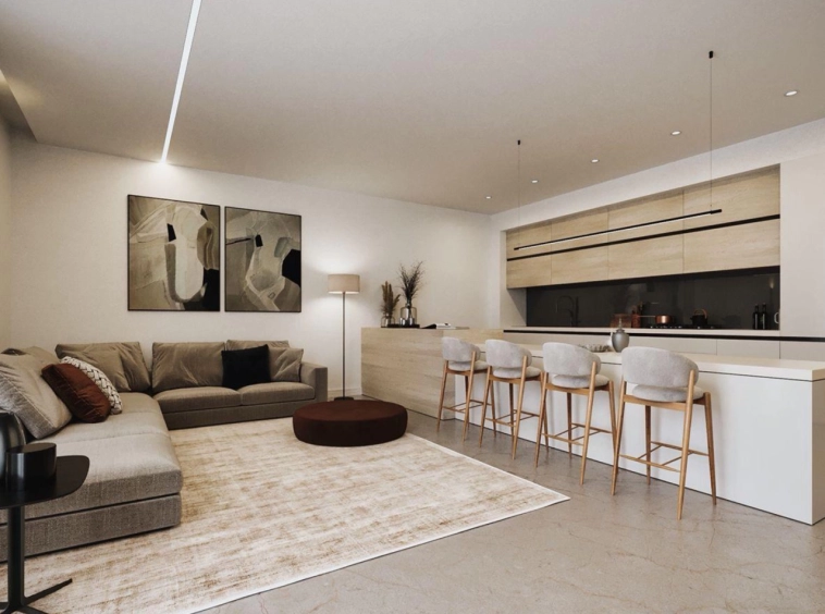 Living room and kitchen interior at Sarooj Oasis Apartments, Sultan Haitham City