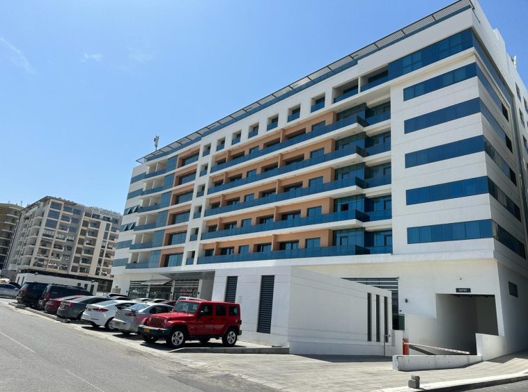 Exterior of The Pearl Muscat Hills retail and residential building