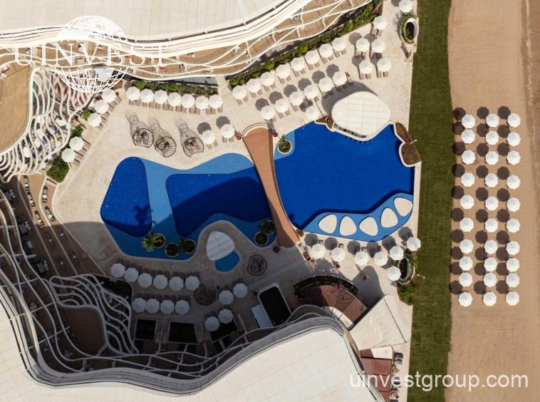 Aerial view of The St. Regis Al Mouj Muscat Resort and Residences on the Al Mouj beachfront, Oman