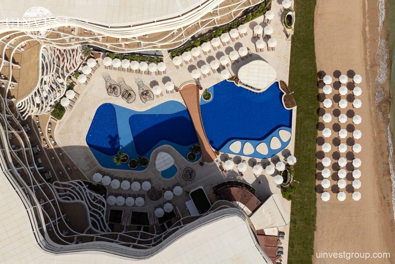 Aerial view of The St. Regis Al Mouj Muscat Resort and Residences on the Al Mouj beachfront, Oman