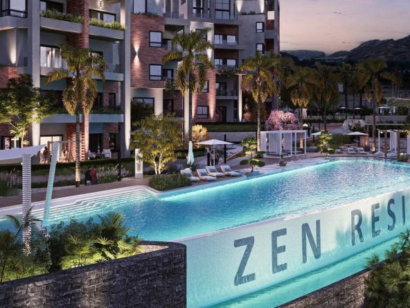 Zen Residences branded infinity pool at twilight, Muscat Bay