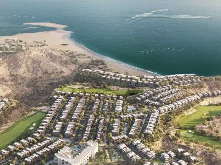 Aerial view of the AIDA gated community at Yiti, showing the clifftop villas, golf course and beach on the Gulf of Oman.