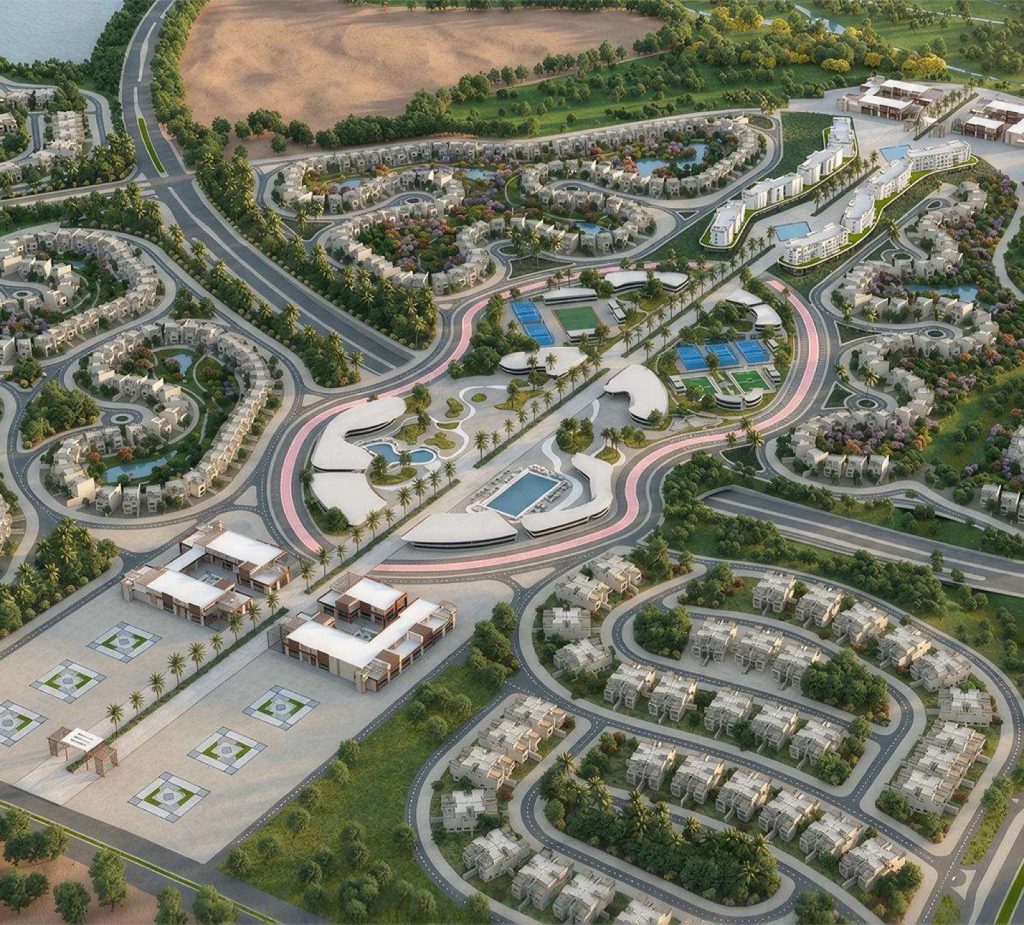 Aerial view of the Jood master plan in Sultan Haitham City, Muscat, showing villa neighbourhoods, pools and the central sports and social club.