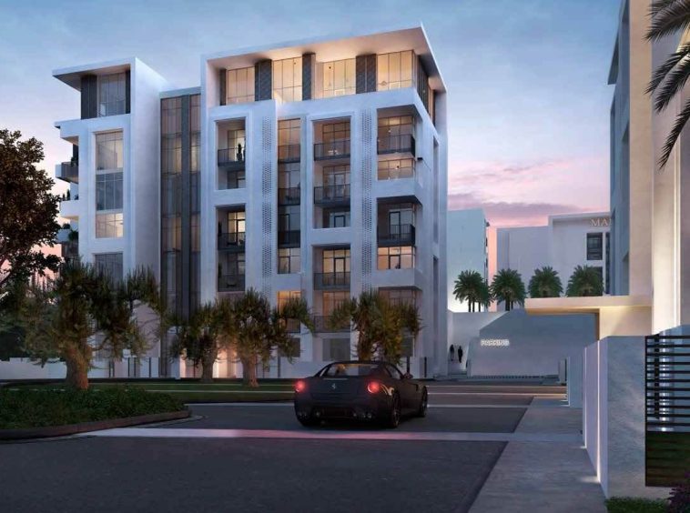 Dusk exterior of a residential tower at The Residences at Mandarin Oriental