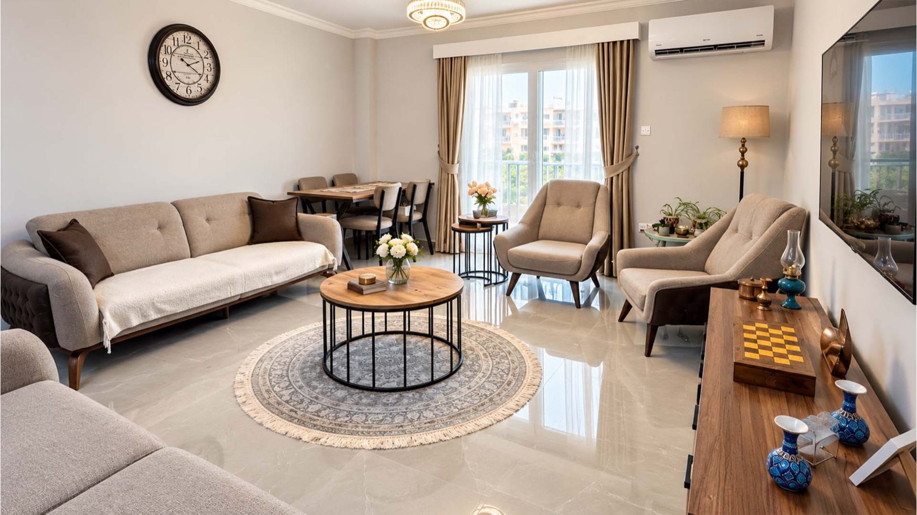 Angel Towers apartment living and dining room with sofas and a coffee table