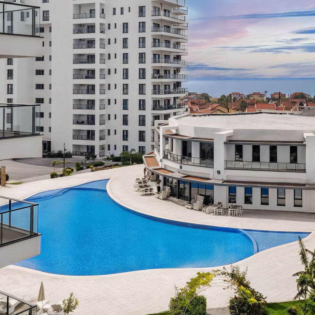 Caesar Blue pool beside the clubhouse and apartment block