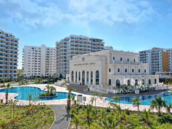 Caesar Resort main building with pools and apartment blocks, Long Beach, North Cyprus