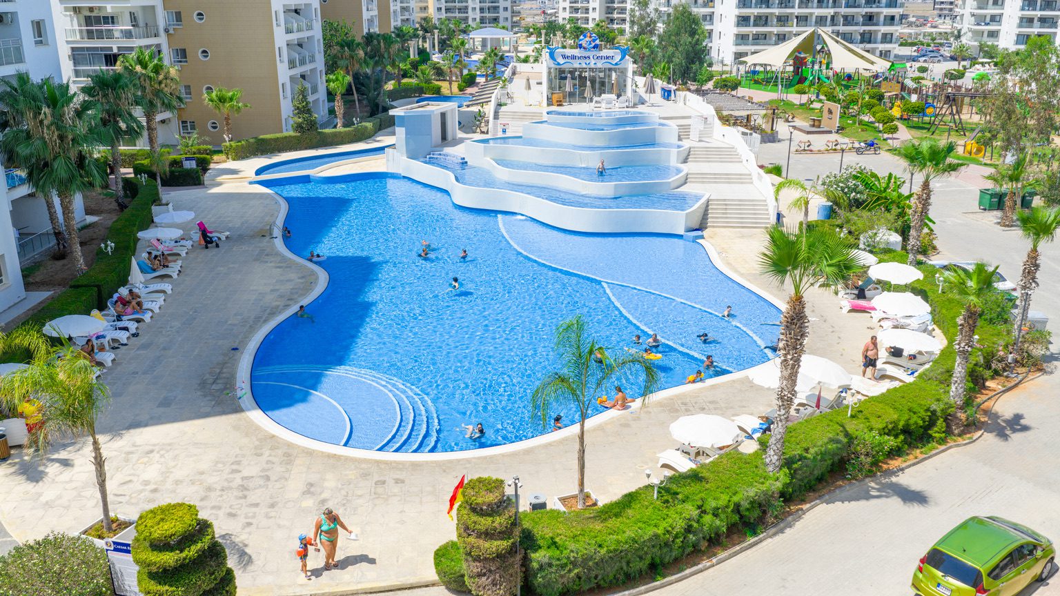 Caesar Resort stepped swimming pool between apartment blocks