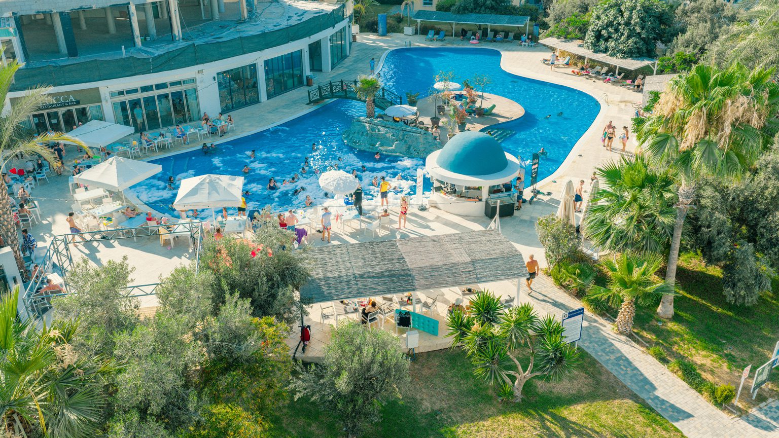 Caesar Resort pool with terraces and landscaped garden