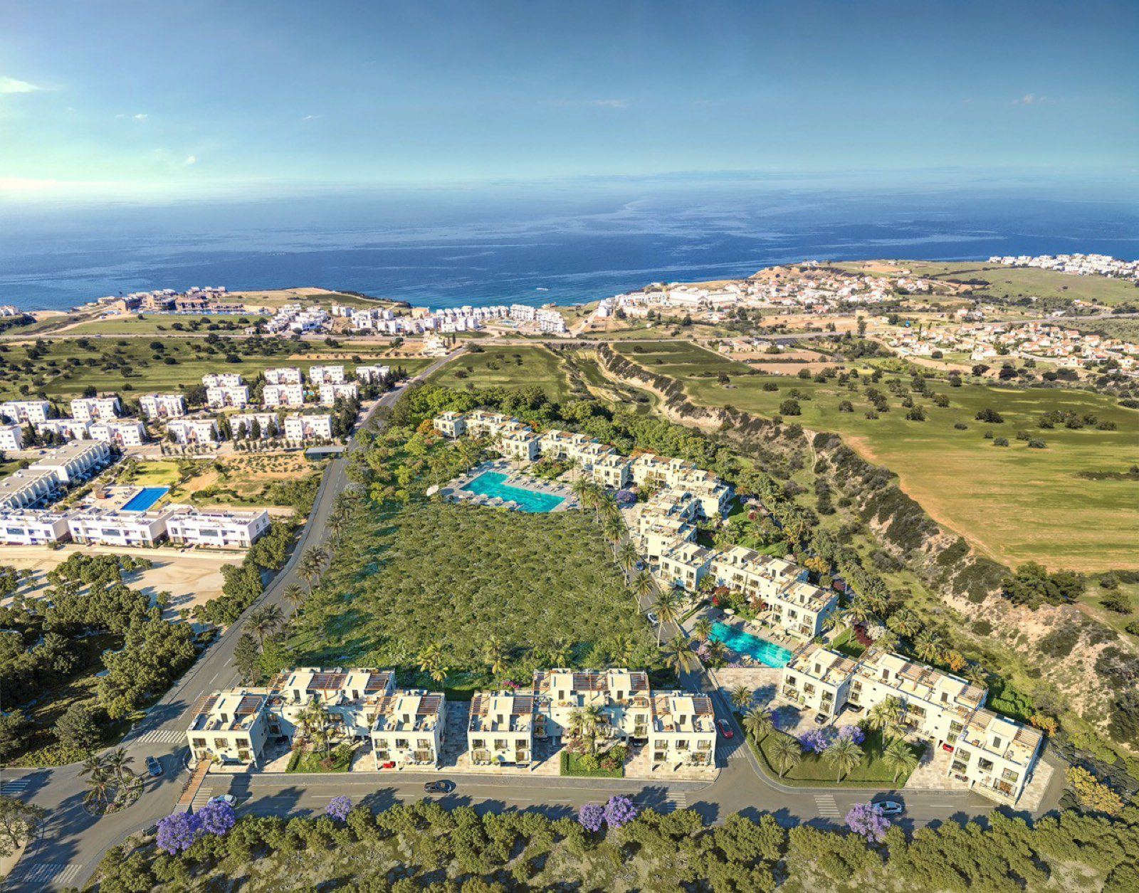 Render: aerial view of the apartment blocks with the sea and coast beyond