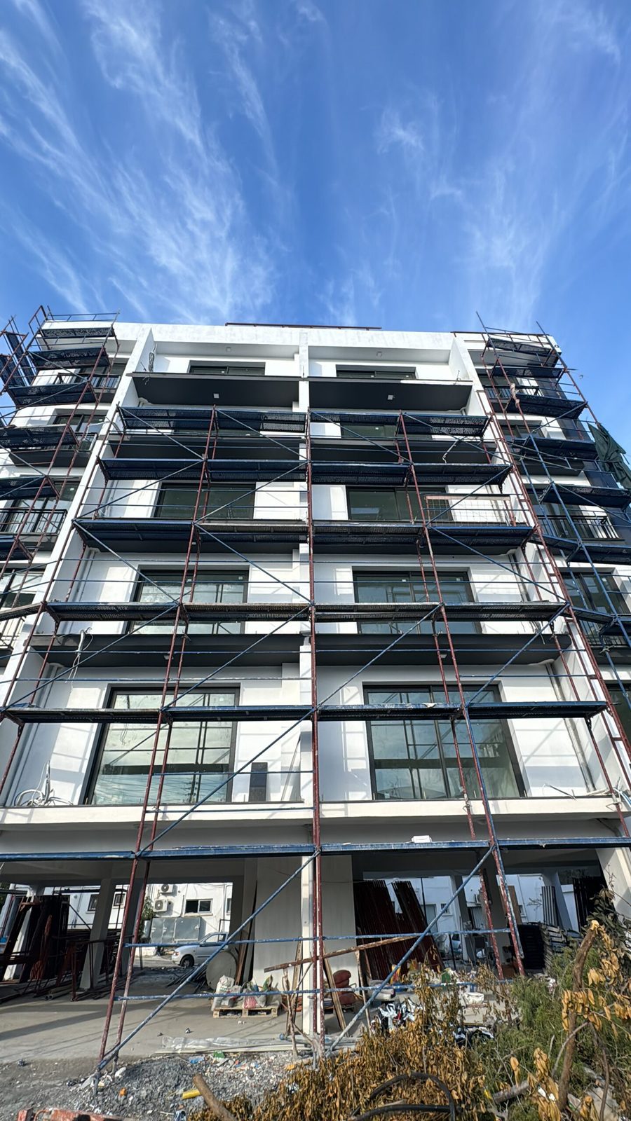 Photo of the balconies on the upper floors with scaffolding still in place