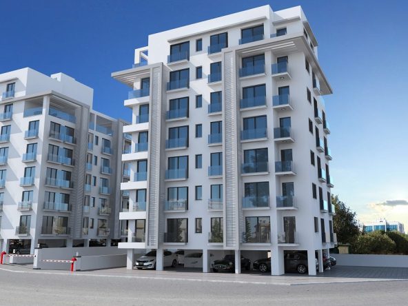 Rendering of two white seven-storey apartment blocks with car parking below