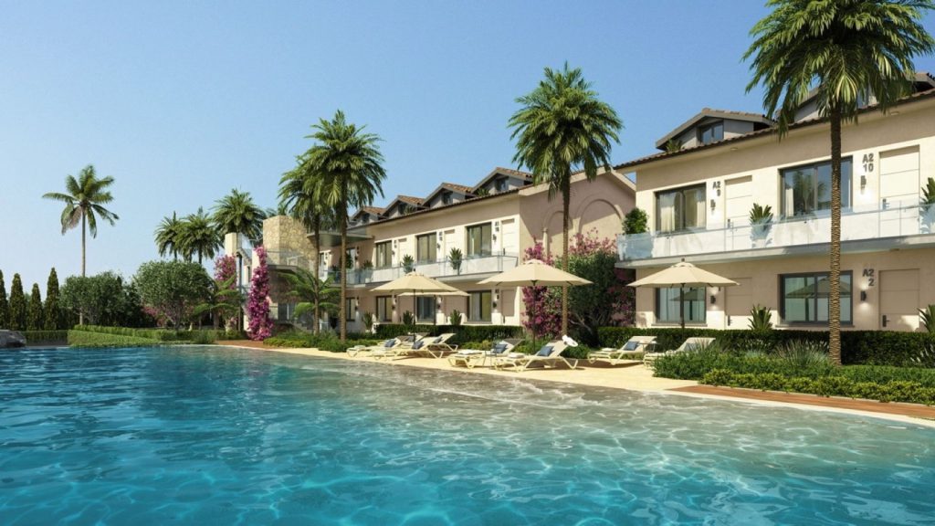 Lagoon Tatlisu render: swimming pool in front of two-storey terraced apartments