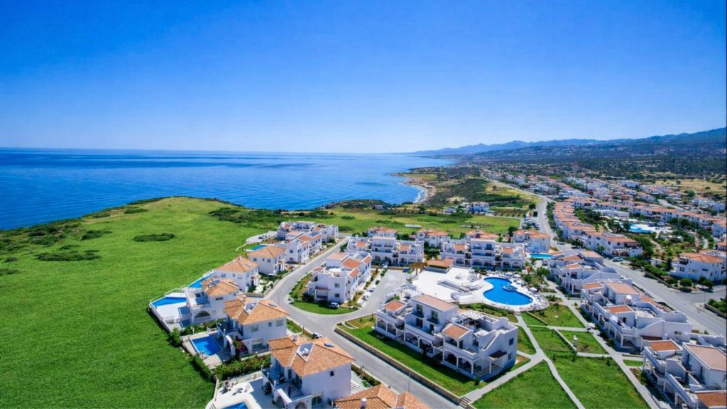 Sea Magic Premium Esentepe aerial view of apartment blocks beside the coast
