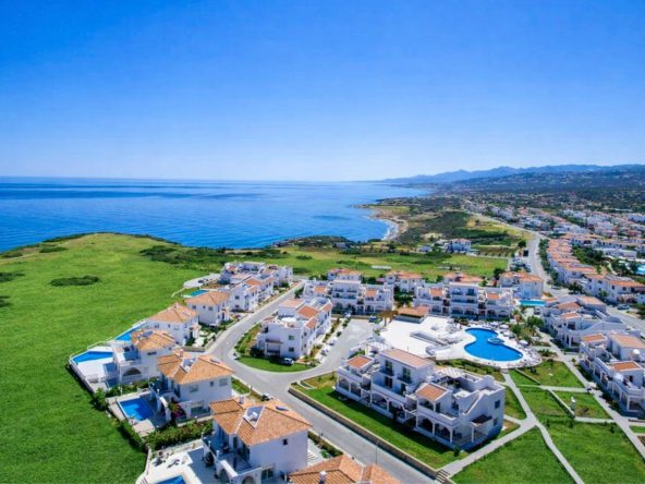 Aerial view of the Sea Magic Premium apartment blocks beside the coast, Esentepe