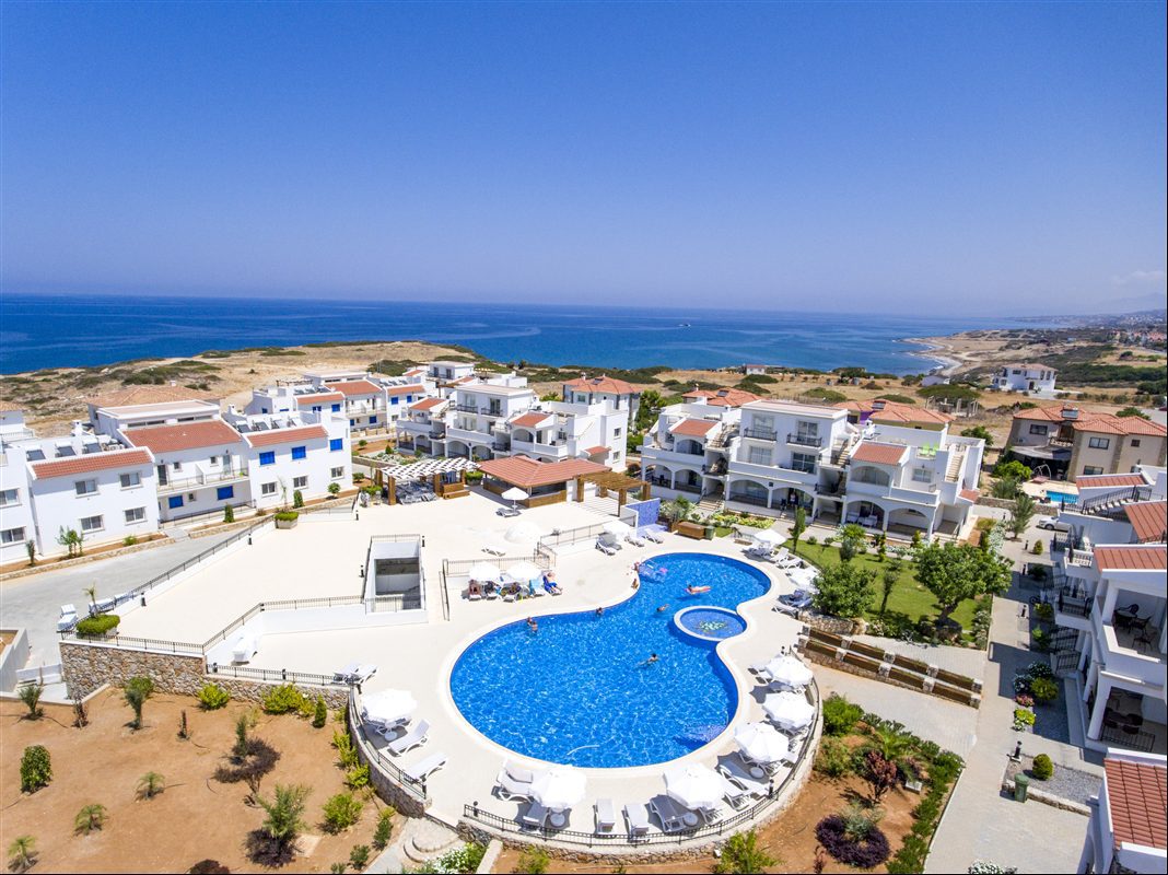 Aerial view of the communal swimming pool and surrounding apartment blocks