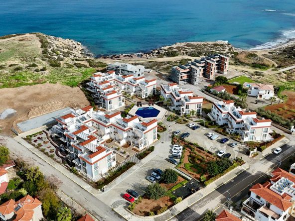 Aerial view of the Sea Magic Royal apartment blocks beside the coast, Esentepe