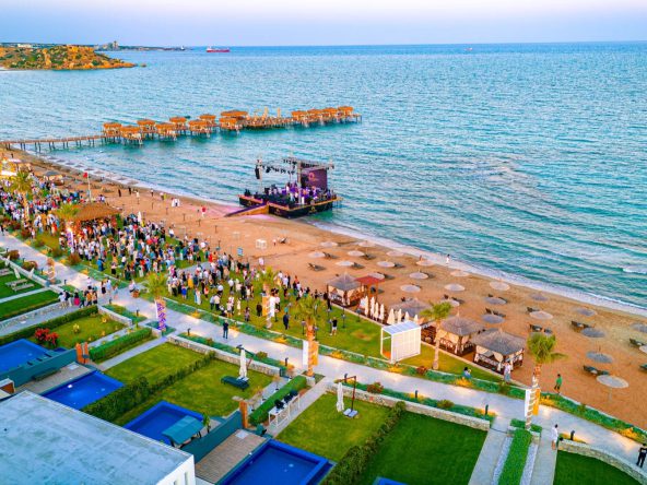 Four Seasons Life aerial view of the beach, pier and landscaped gardens