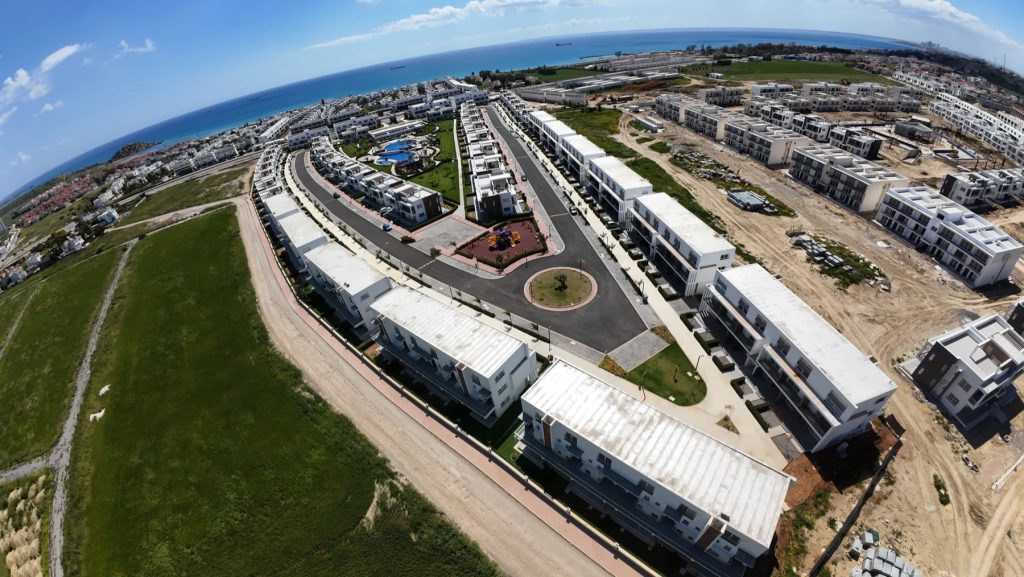 Four Seasons Life II aerial photo of terraced blocks and the coast