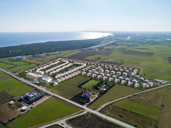La Isla aerial photo of the completed villa community and the coast