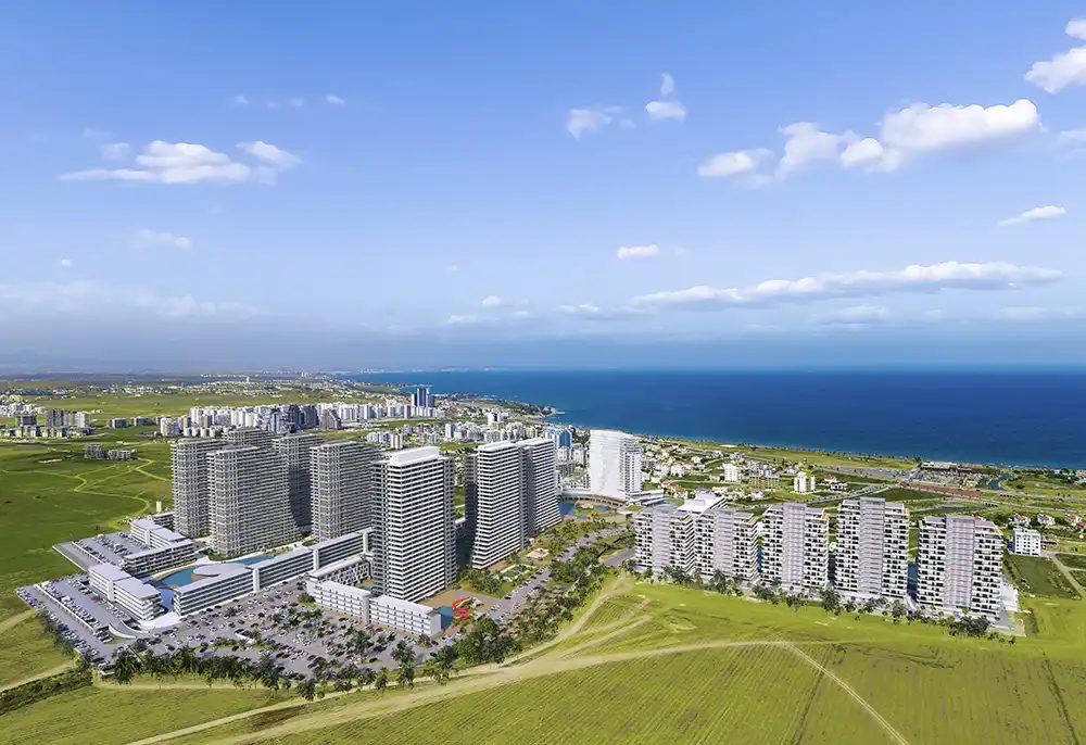 Aerial render of the tower blocks beside the coastline