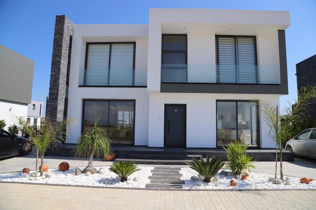 Kentplus Famagusta two-storey white villa with front garden